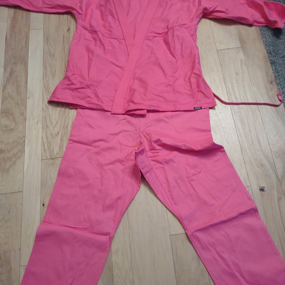 Century jujitsu hi, size 4 pink. Brand new